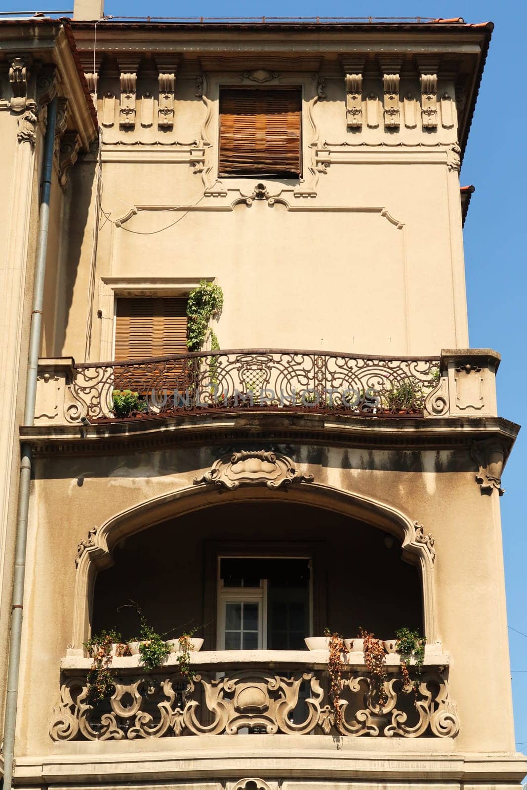 Facade of an old Art Nouveau building with two beautiful balconies in the city center of Belgrade, Serbia 2022