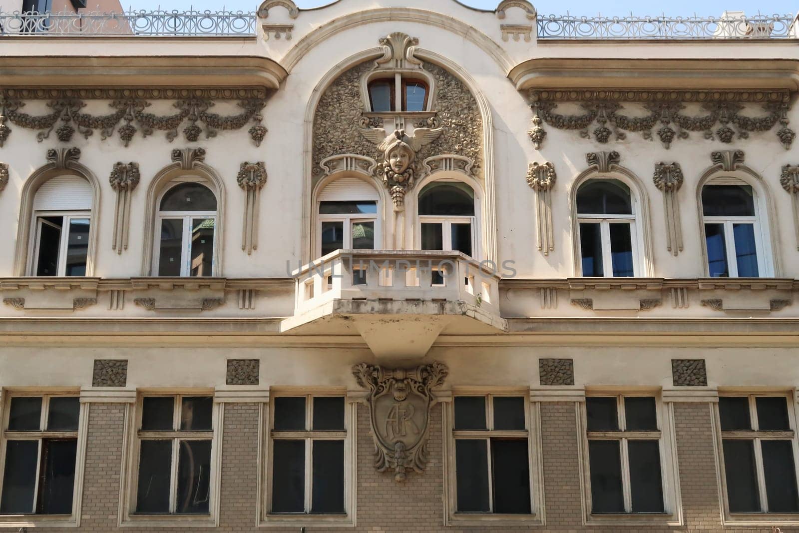The elaborate facade of the Aron Levi Trading House decorated with many ornaments and reliefs, an example of Art Nouveau architecture in the city center of Belgrade, Serbia 2022