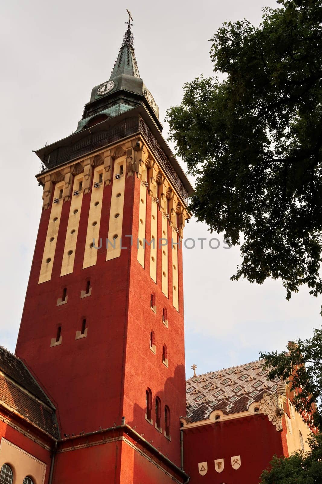 The high clock tower of the city hall, town hall of Subotica, an example of Art Nouveau architecture in the city center, Subotica, Serbia 2022