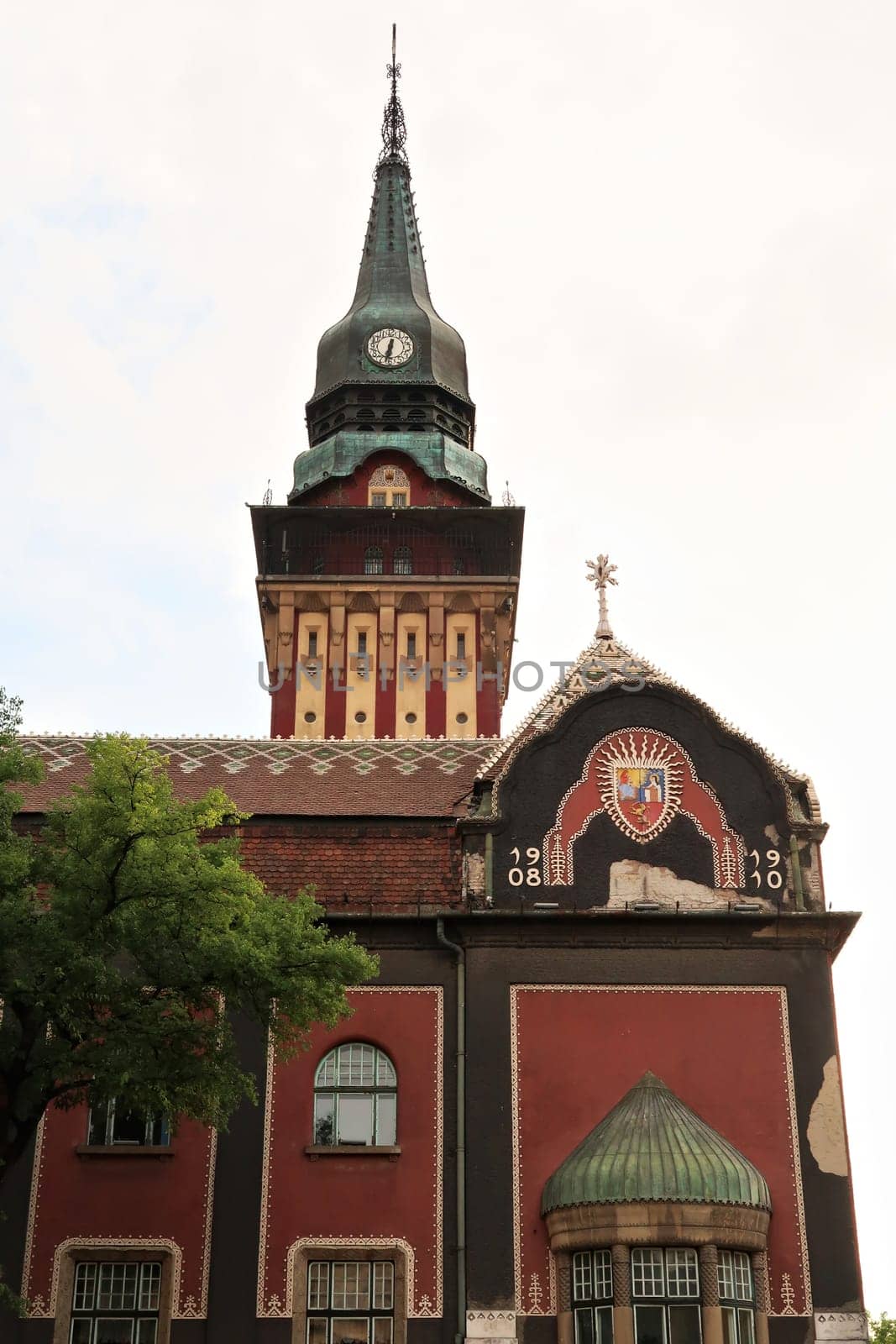 The facade and clock tower of the city hall, town hall of Subotica, an example of Art Nouveau architecture in the city center, Subotica, Serbia 2022