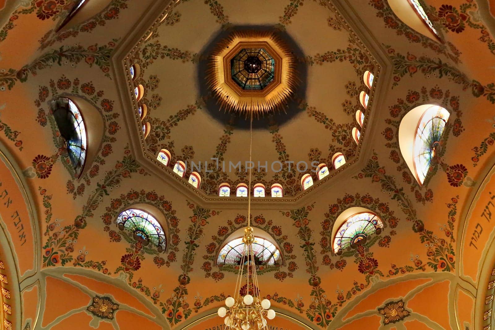 The colorful ceiling, vault, dome inside the Synagogue of Subotica, completely covered in floral patterns, details, paintings, Subotica, Serbia 2022