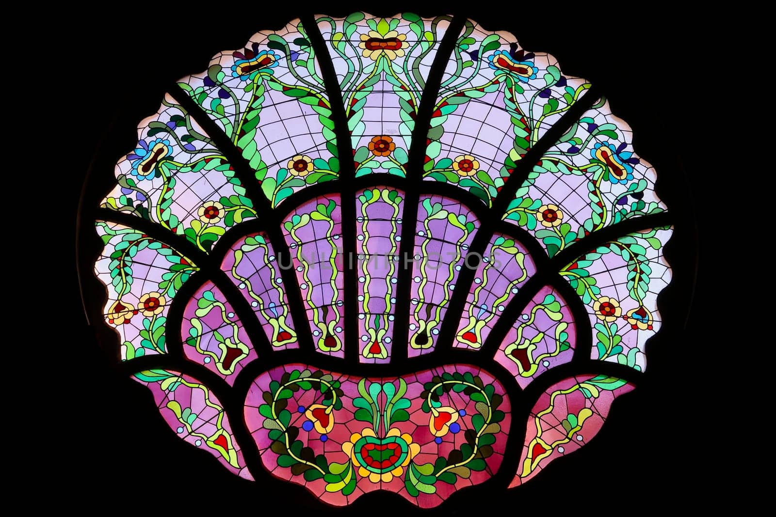 Stained glass window in different shades of purple inside the Synagogue of Subotica, second floor, Subotica, Serbia 2022