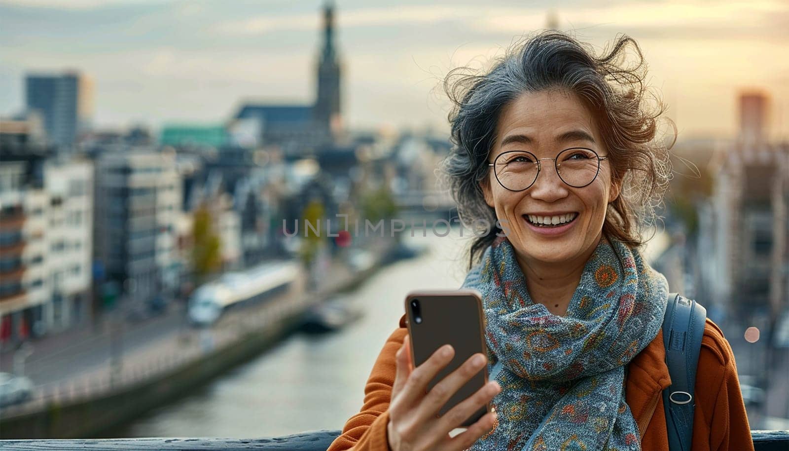 Happy Asian woman using mobile phone making a video call or taking selfie during travel enjoy urban outdoor lifestyle travel city street on holiday vacation.