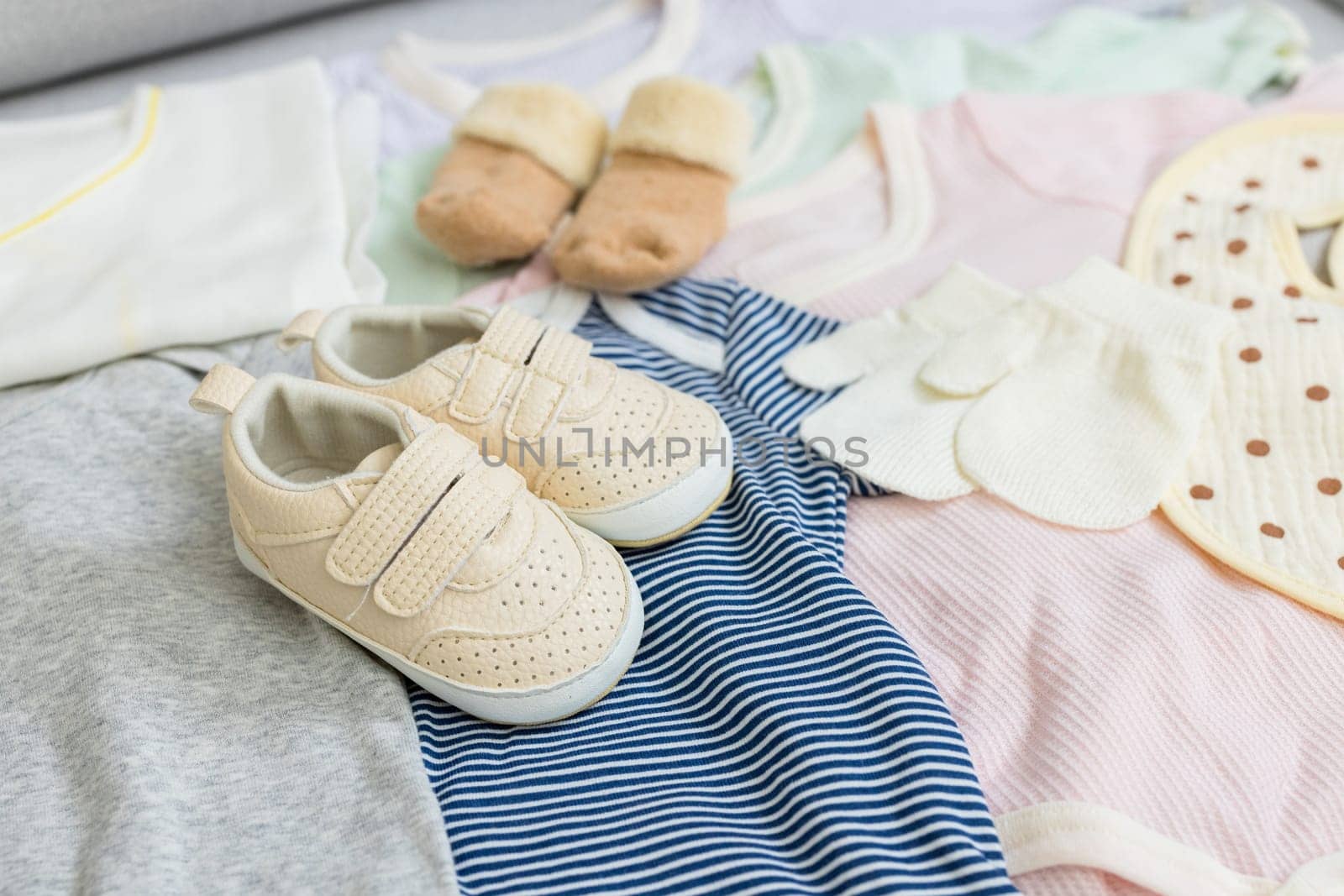 Baby clothes with baby shoes