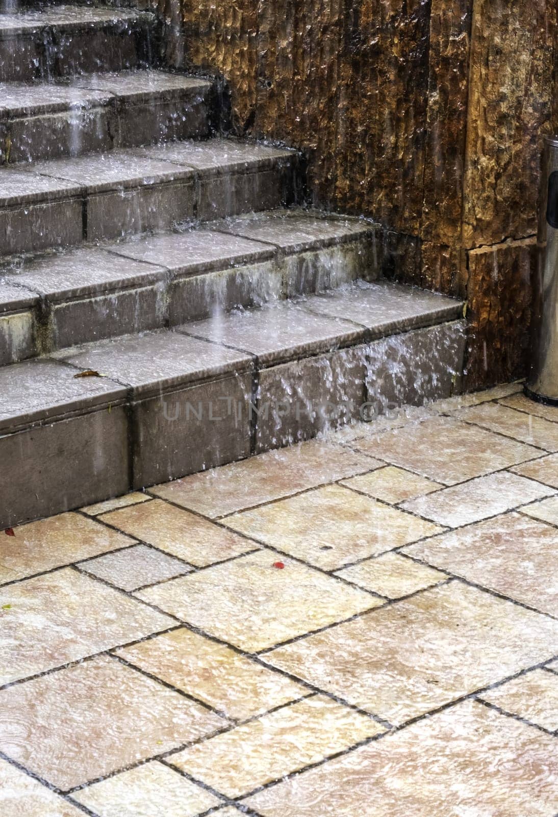 Detail of stairs on a cold rainy day, flood