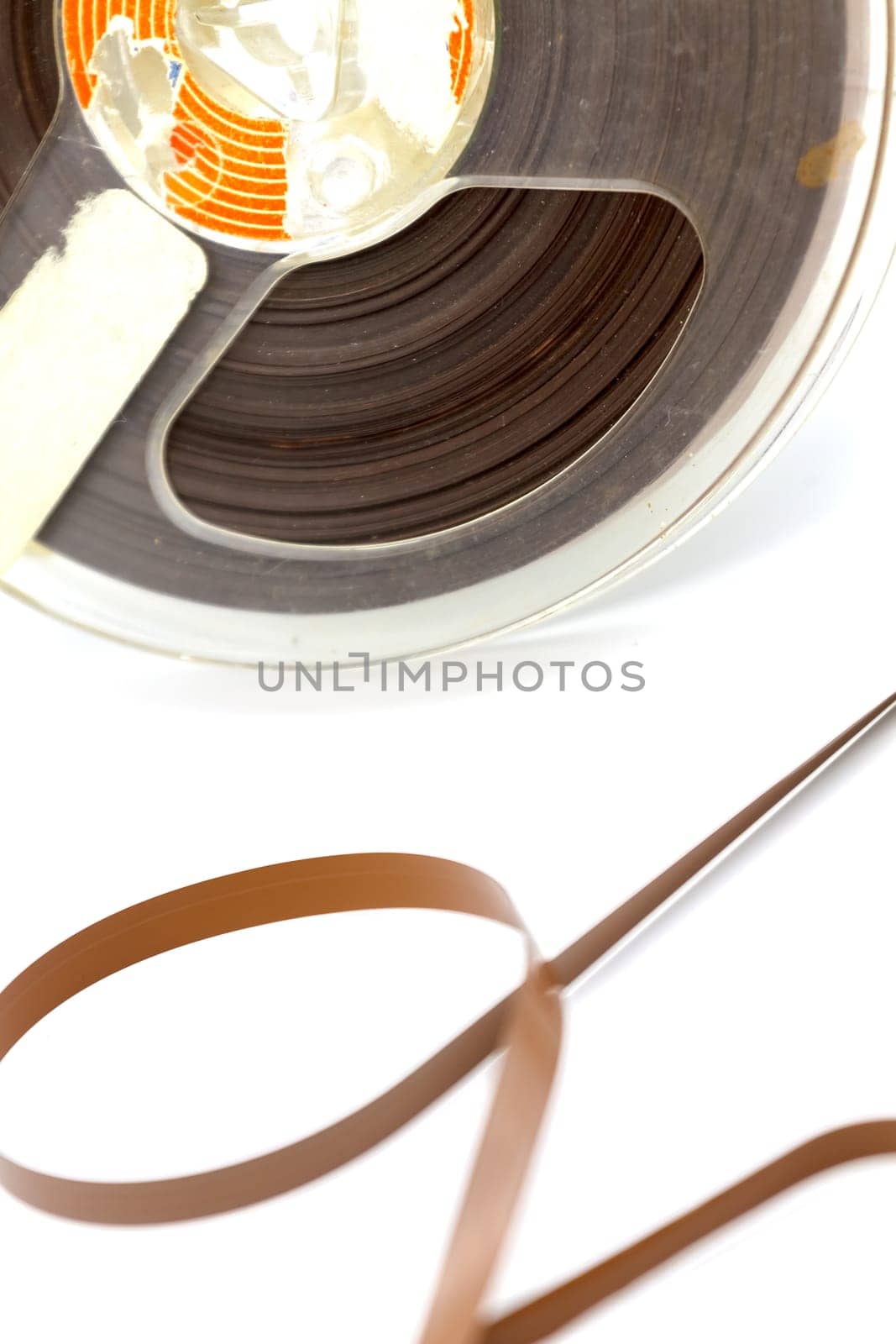 Vintage audio tape recorder with traces of use and dust.Selective focus with shallow depth of field.