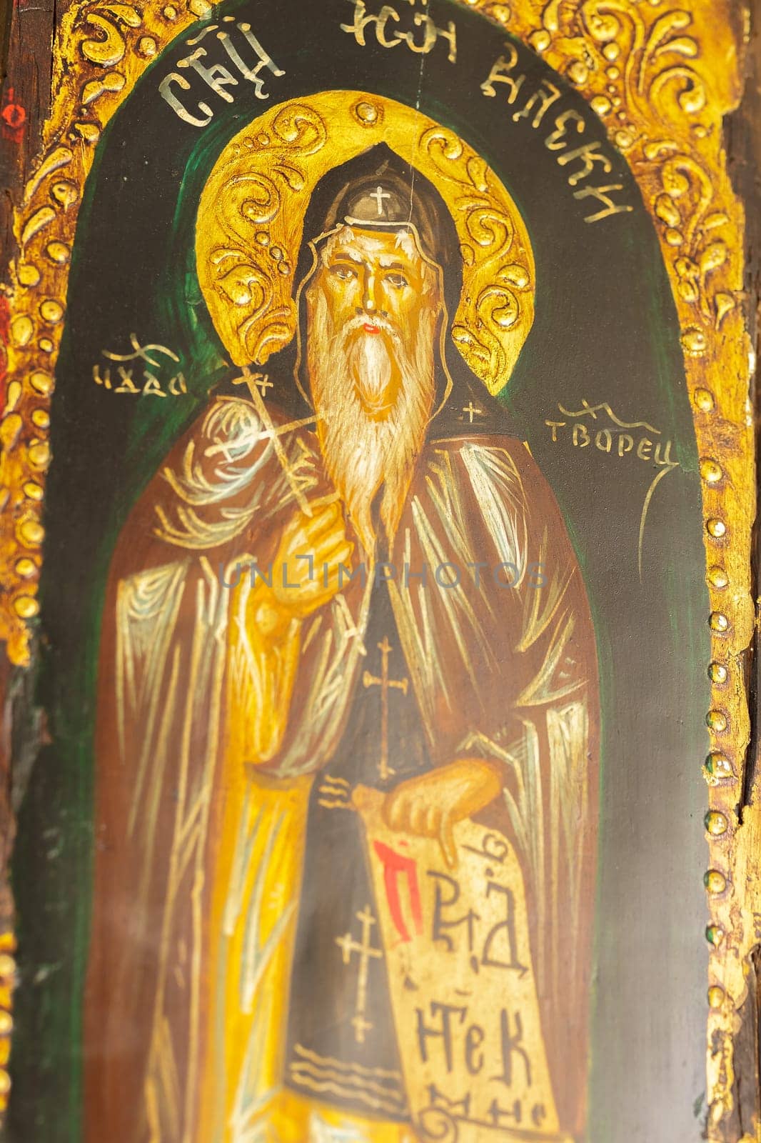 Detail of an icon with the image of an Eastern Orthodox saint.Selective focus with shallow depth of field.