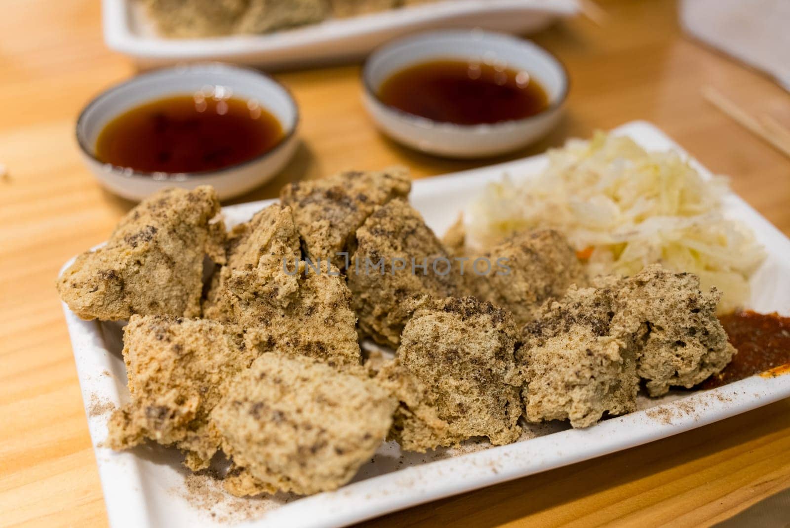 Deep fry stinky tofu on the dish