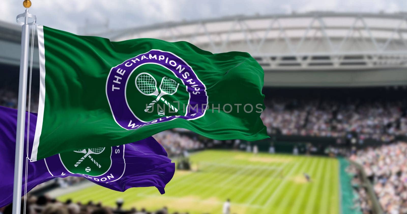 London, UK, June 3 2024: The Championships Wimbledon flags waving with the Centre Court in the background. Major tennis tournament. Illustrative editorial 3d illustration render.