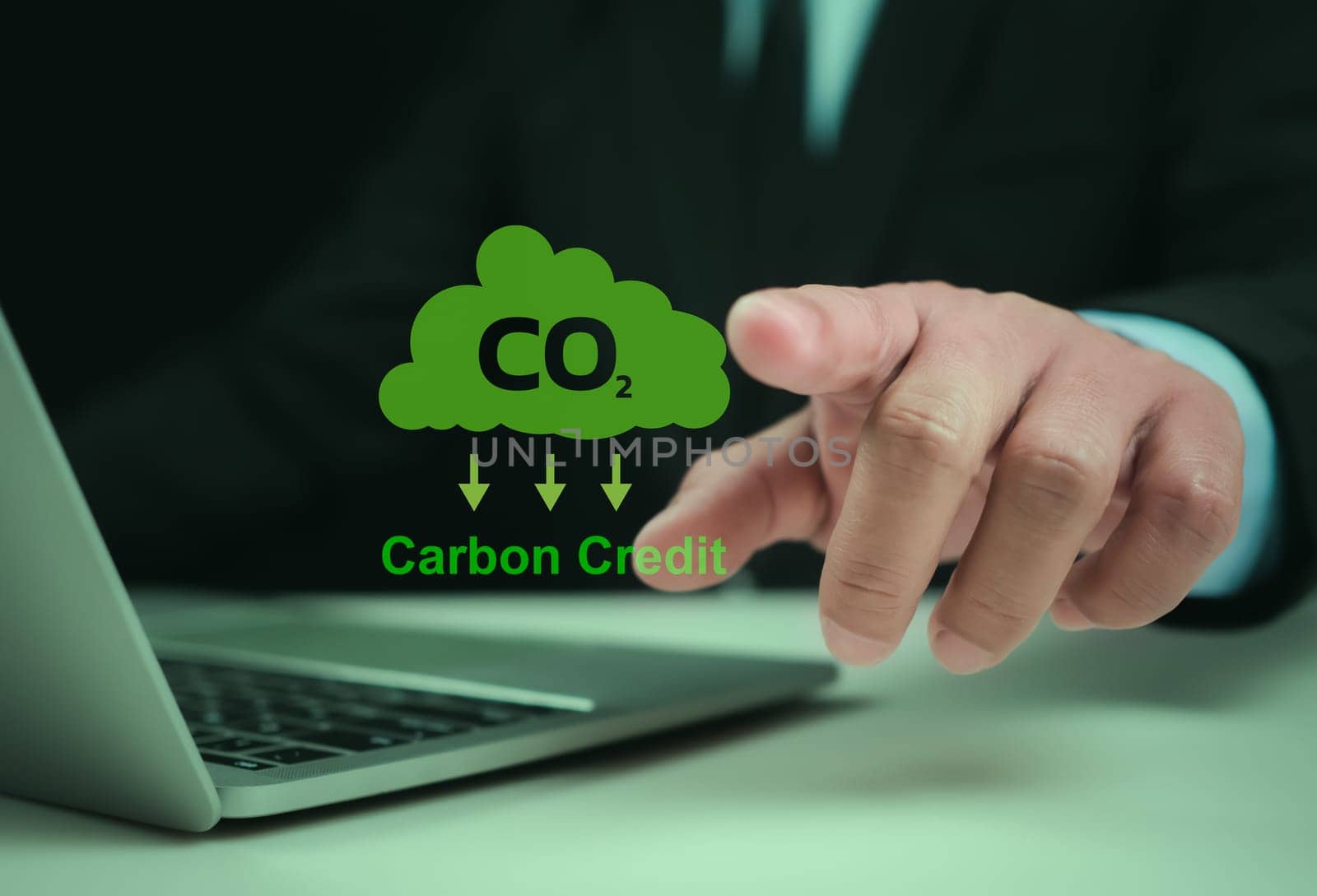 Carbon credit market concept. Businessman uses technology to exchange carbon credits, Carbon etf to invest in sustainable business, green climate funds investment, Net zero emission, Clean technology