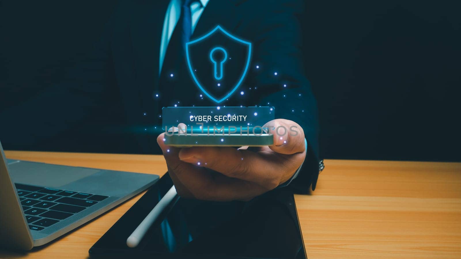 Cyber security technology concept, Businessman use phone and computer online showing protection icons cyber espionage, Represents the code protection, Security concept and communication technology.
