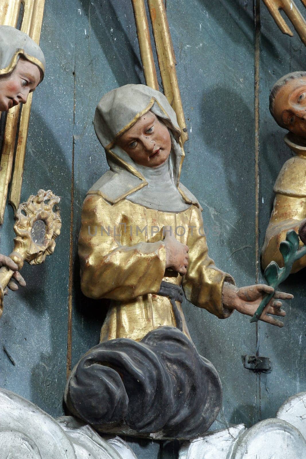Statue of Saint on the altar of Fourteen holy helpers in the church of St. Catherine of Alexandria in Krapina, Croatia