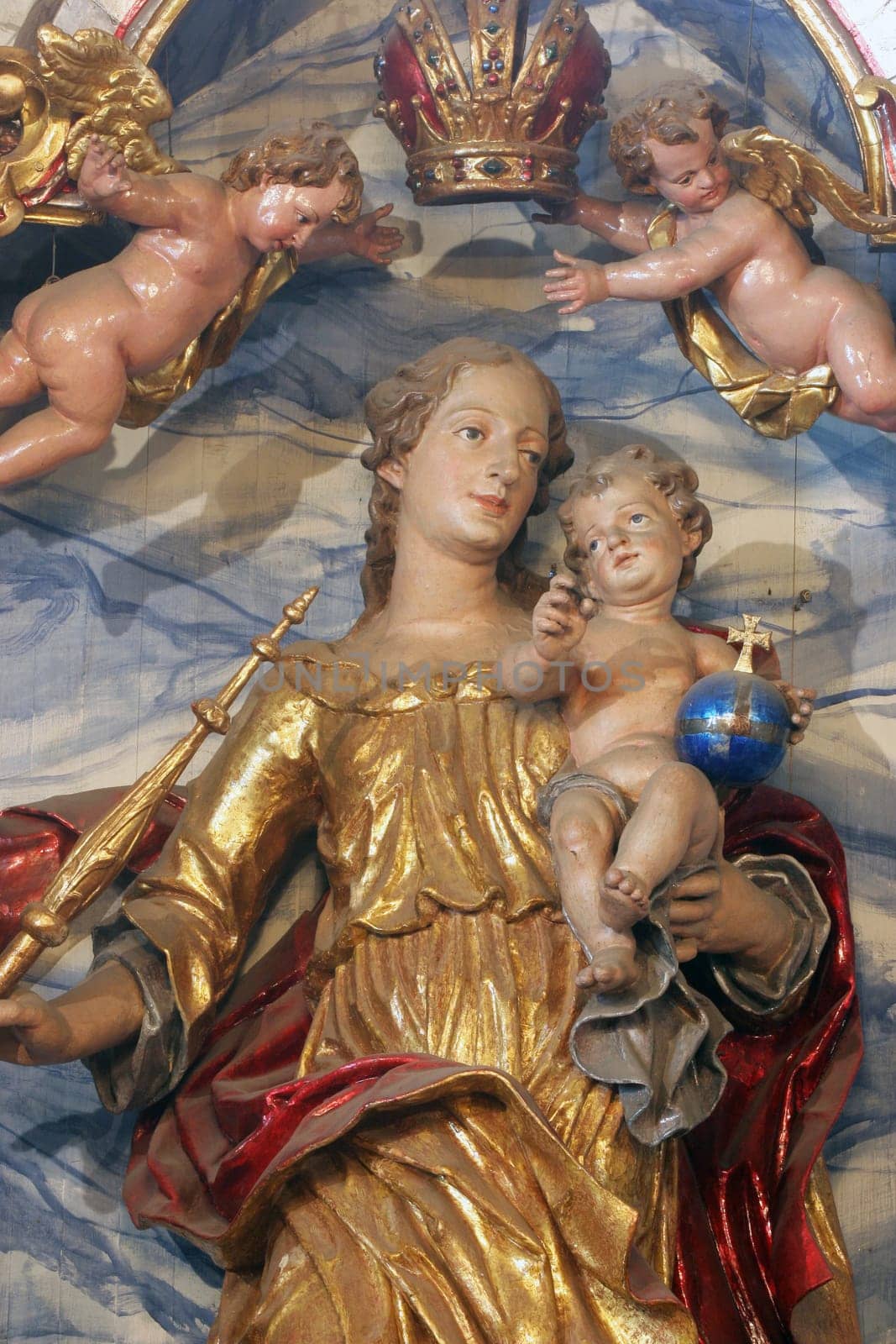 Virgin Mary with baby Jesus, statue on the main altar in the parish church of Our Lady of Snow in Kutina, Croatia
