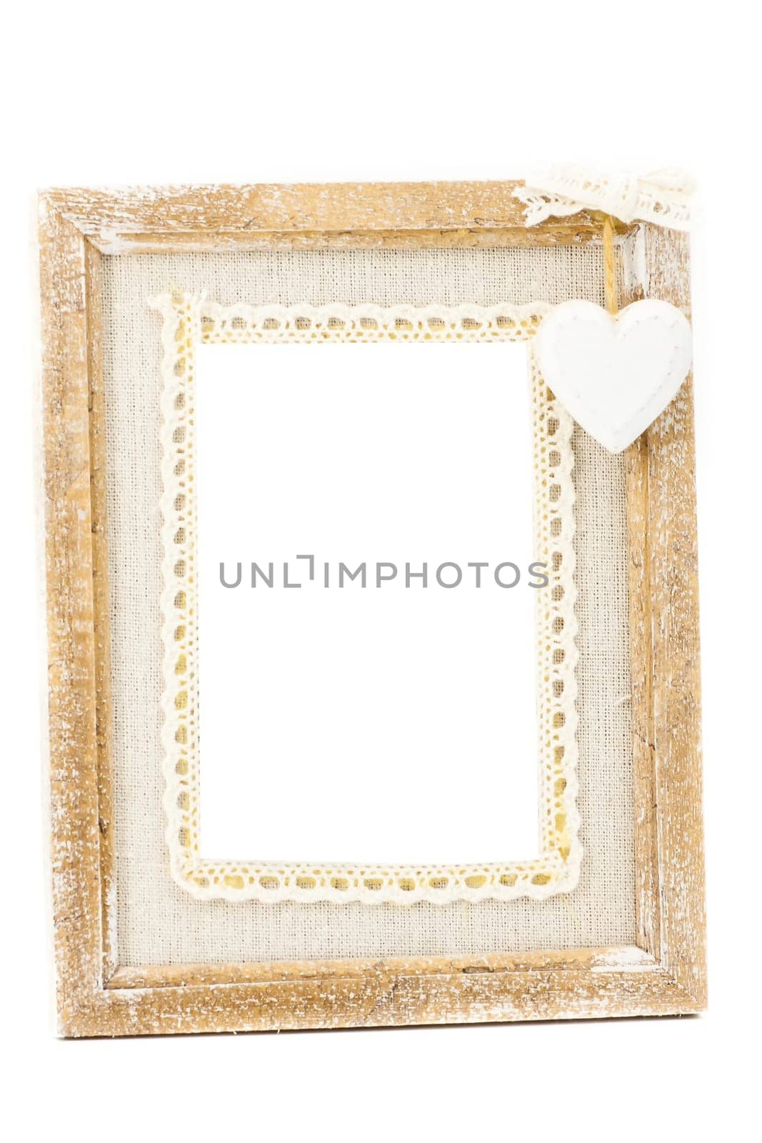 A wooden vintage photo frame has a white background