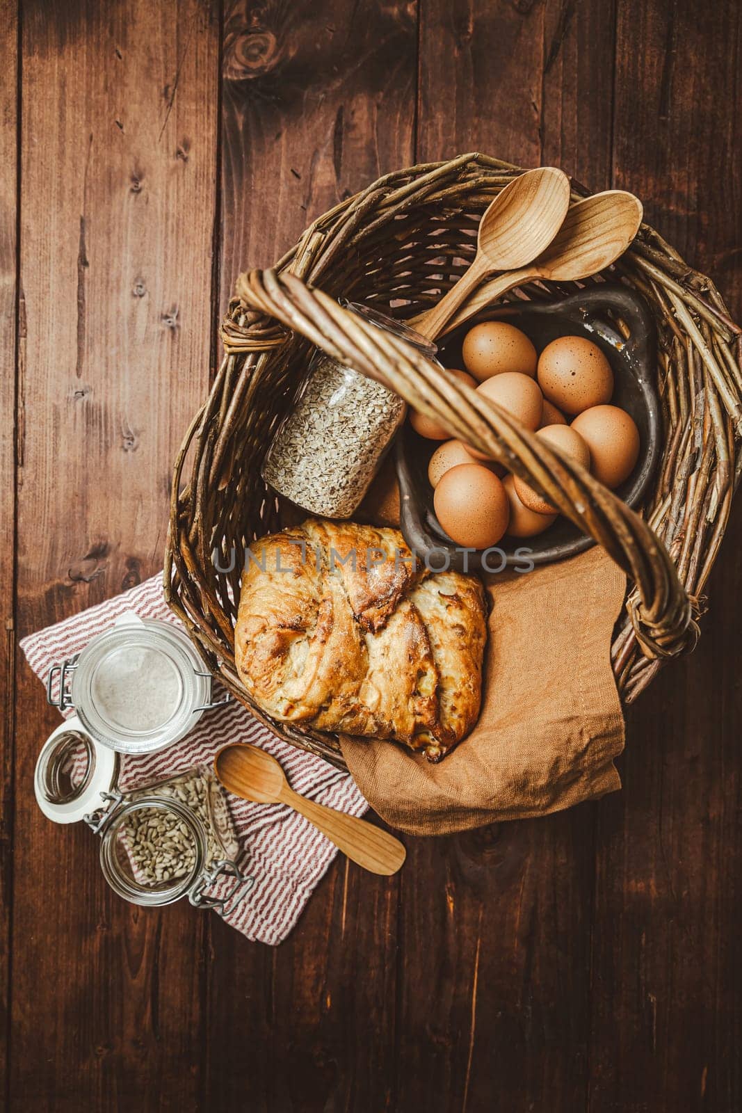 Oatmeal and potato bread on kitchen table in brown tone