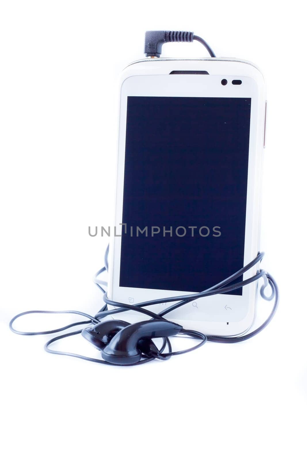 Cellular phone with headphones on white background