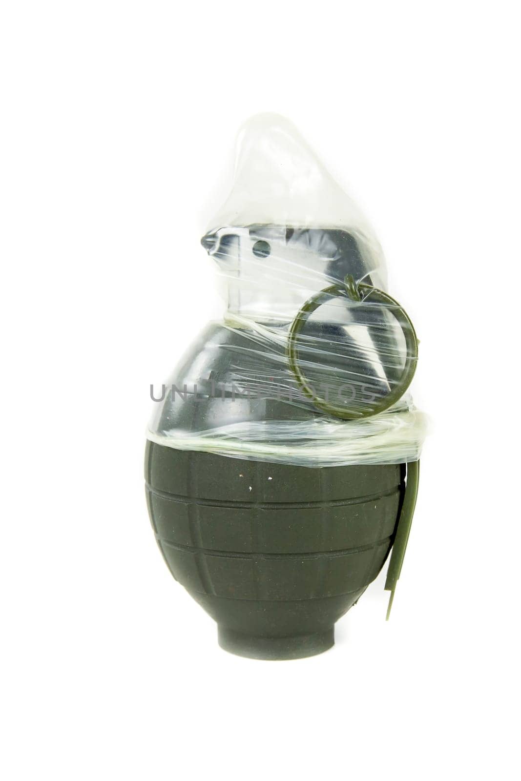 Condoms placed on a hand grenade on a white background