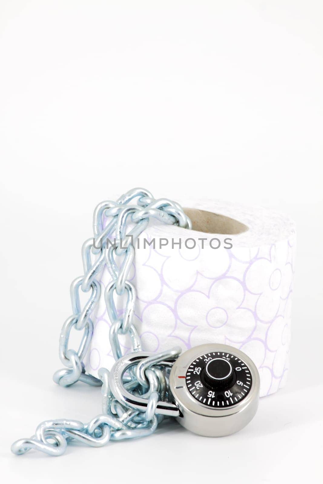 Roll toilet paper locked with padlock and chain on white background