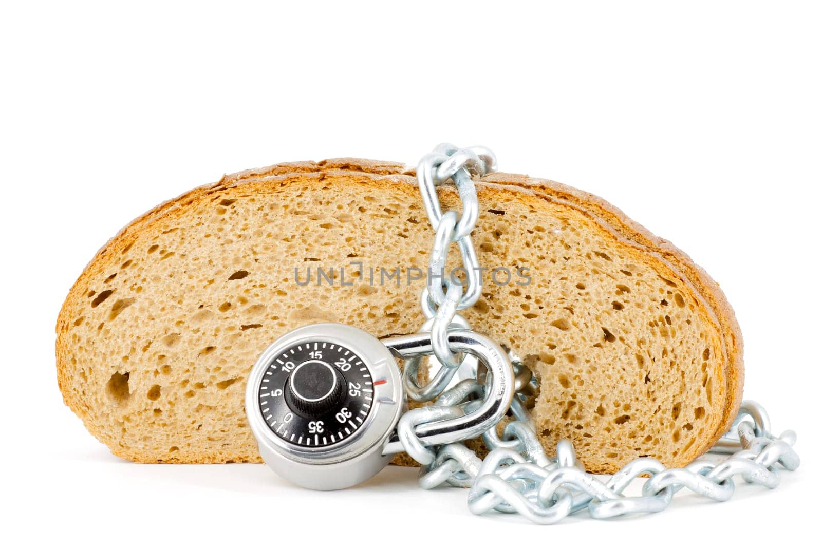 Slices of bread locked with chain and padlock on a white background
