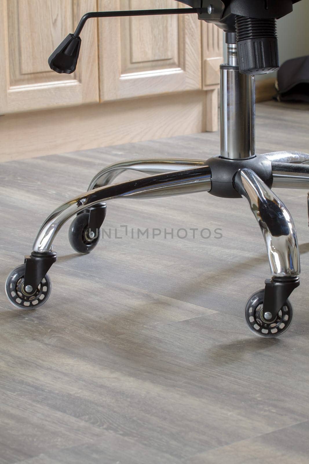 Silent, light silicone wheels on a chrome base of office chair