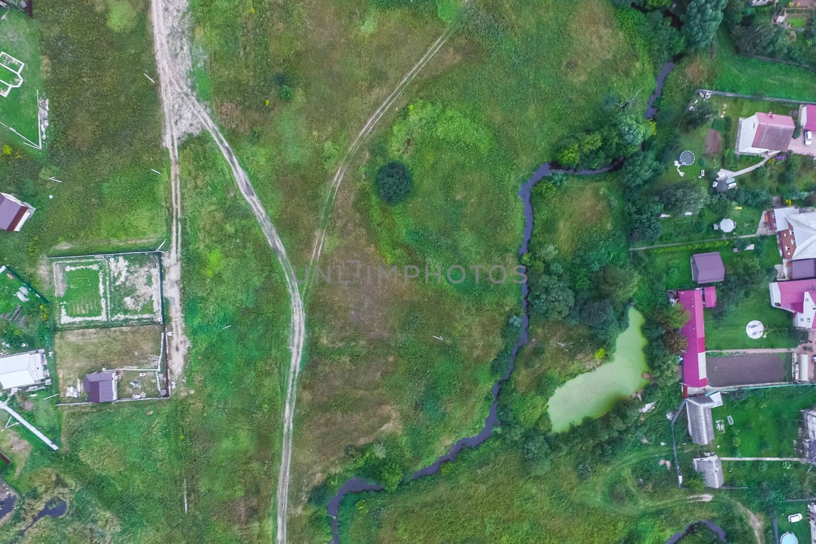 Top view of the village, fields and forests near the village