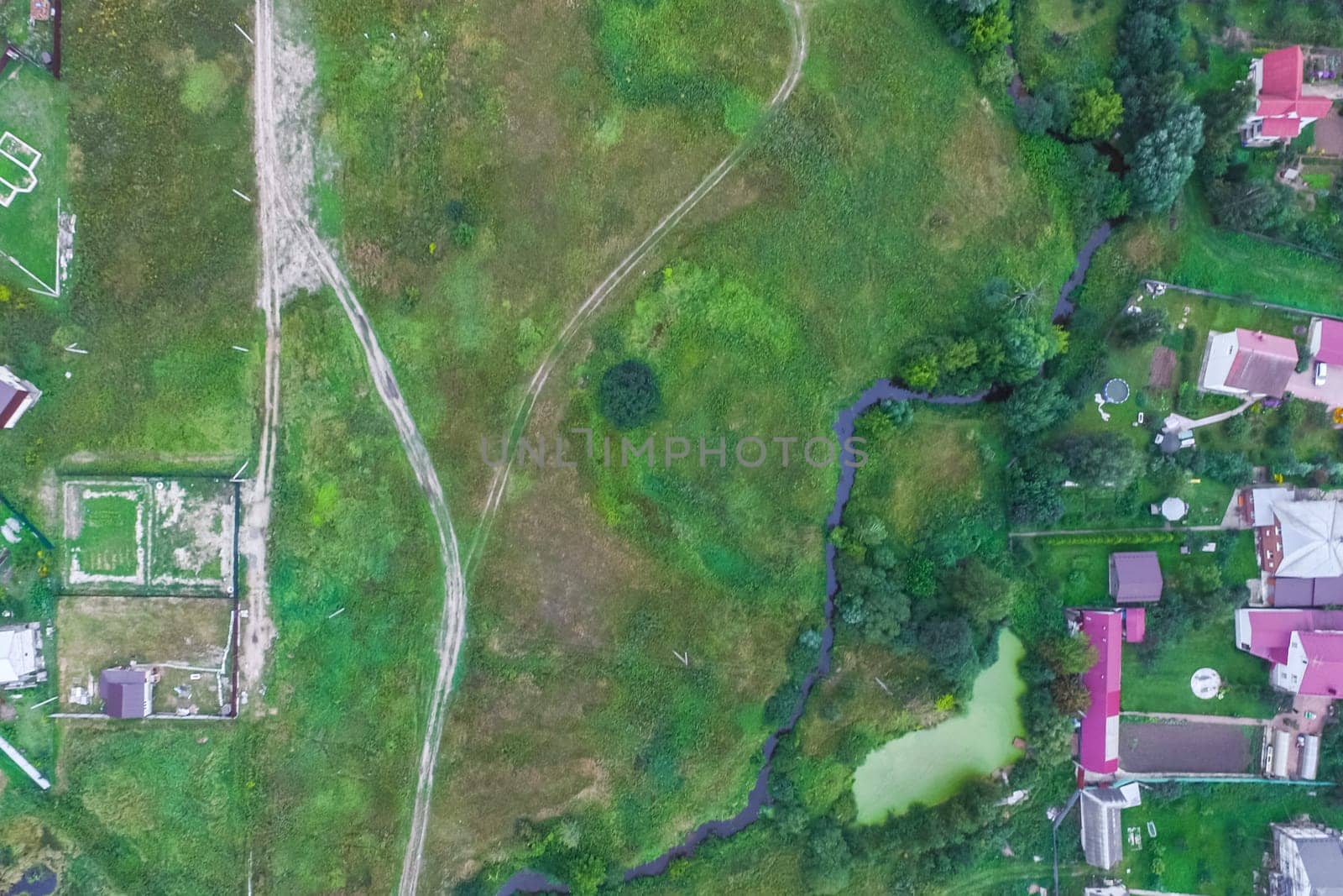 Top view of the village, fields and forests near the village