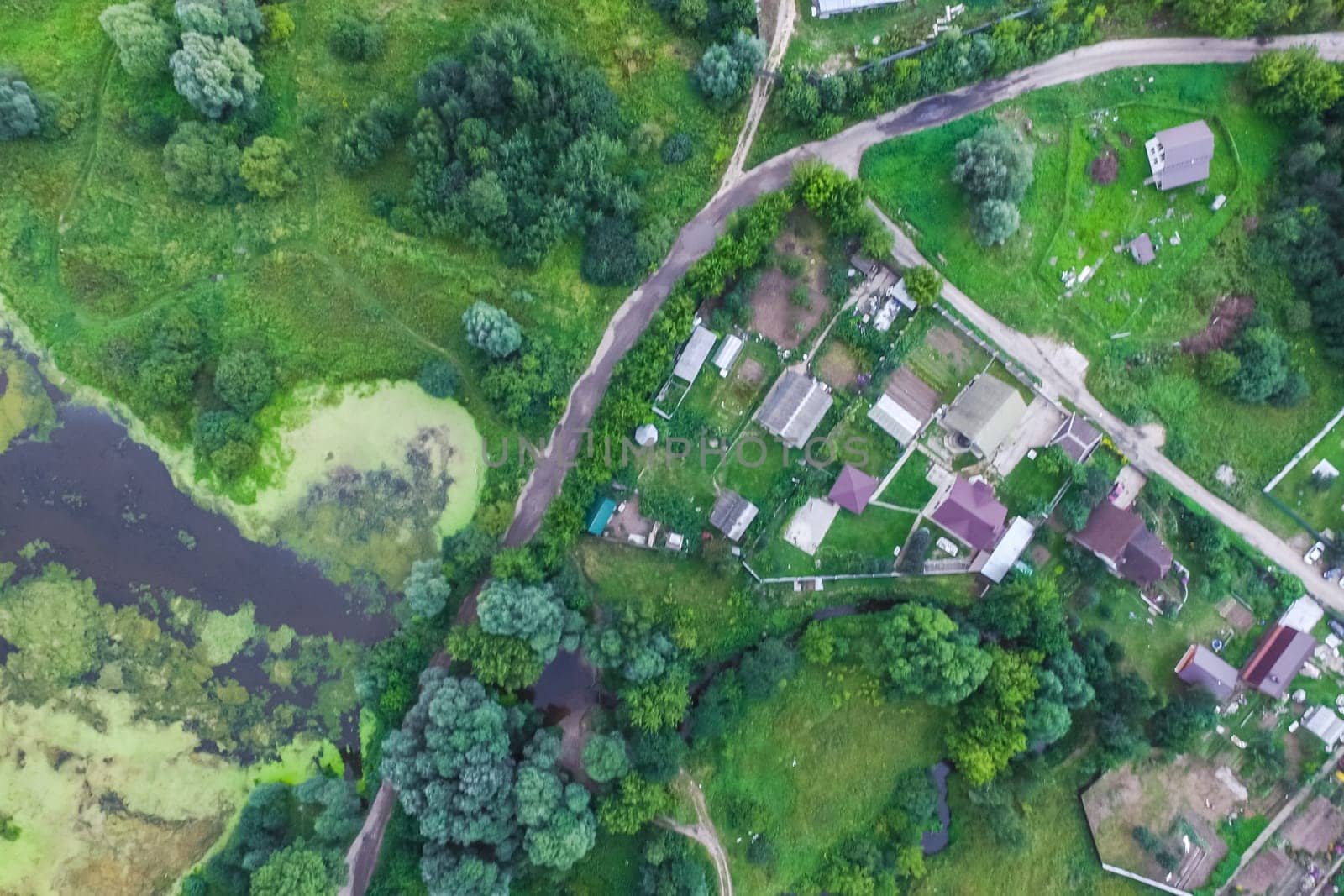 Top view of the village, fields and forests near the village