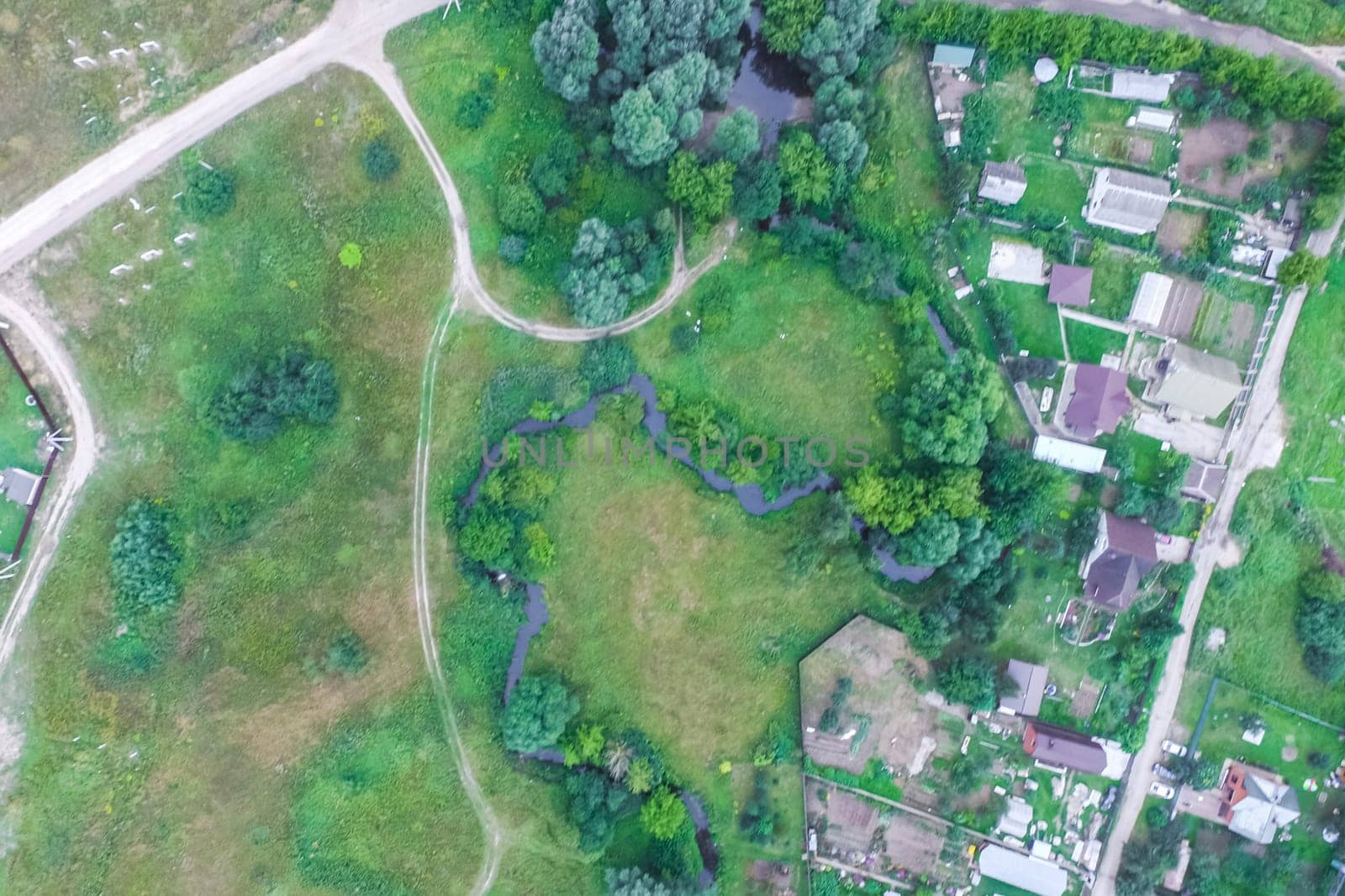 Top view of the village, fields and forests near the village