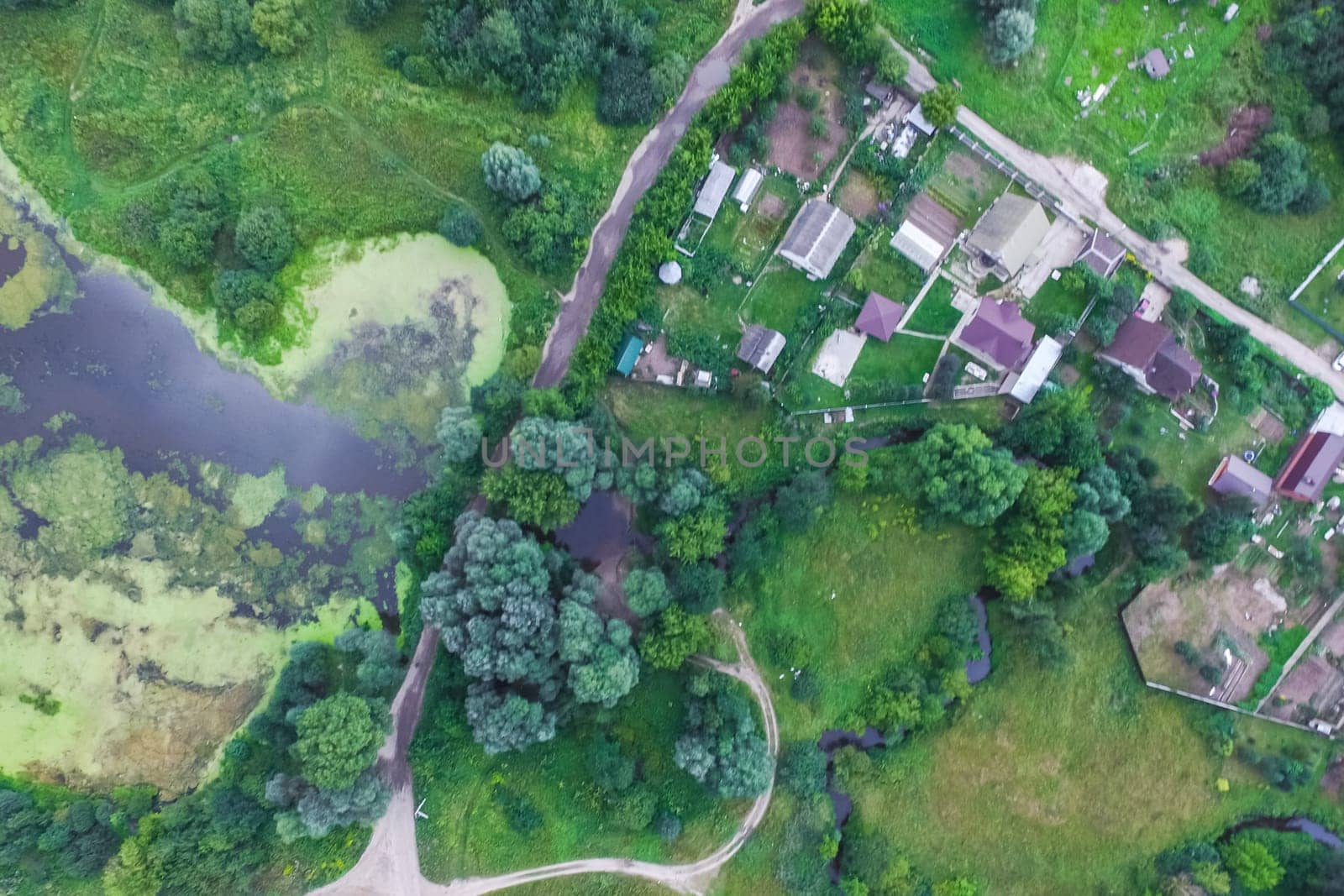 Top view of the village, fields and forests near the village