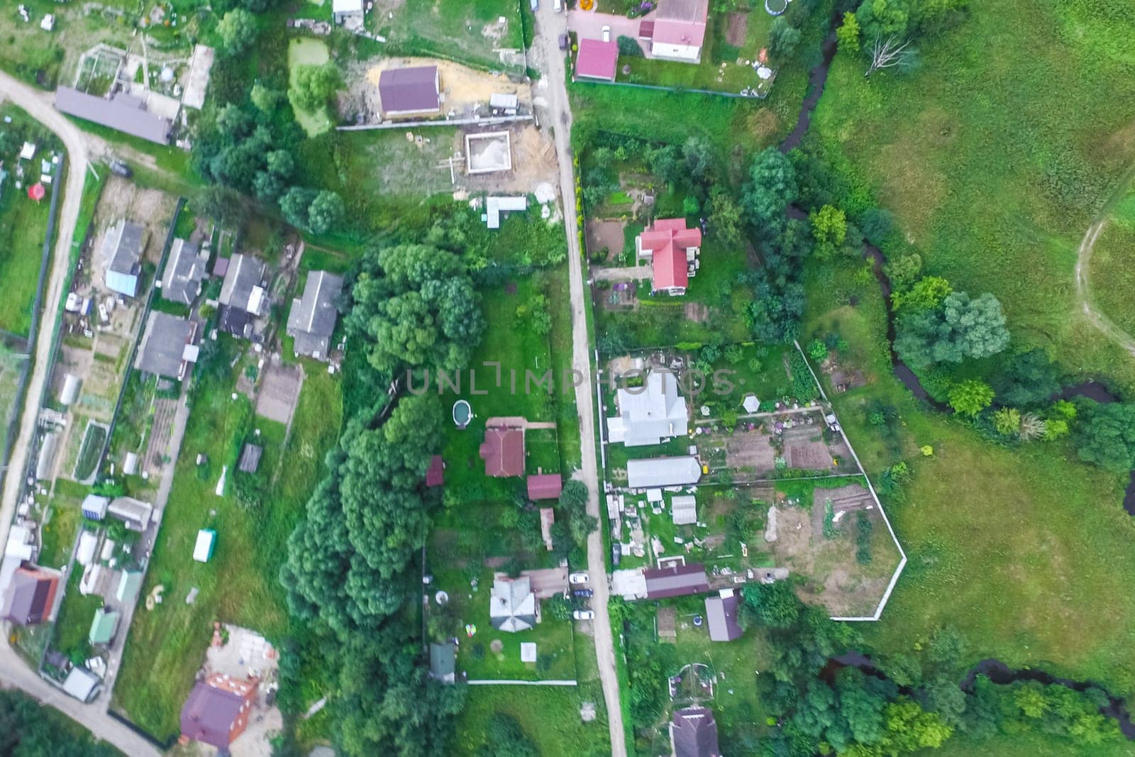 Top view of the village, fields and forests near the village