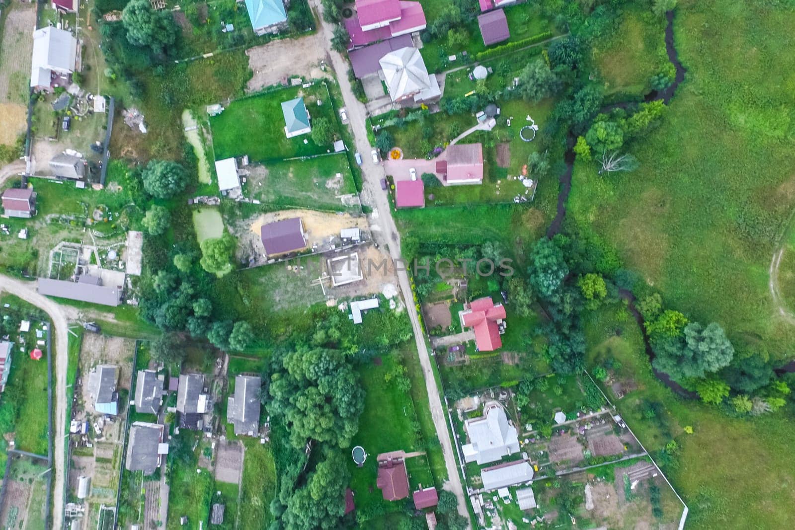 Top view of the village, fields and forests near the village