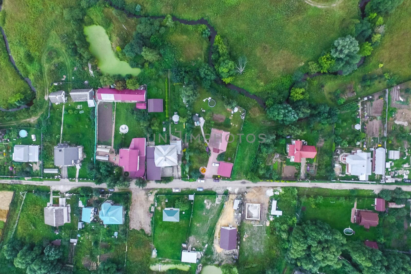 Top view of the village, fields and forests near the village
