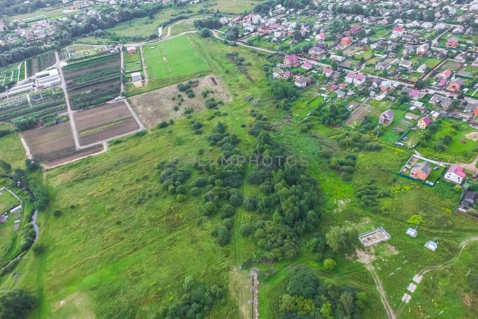Top view of the village, fields and forests near the village