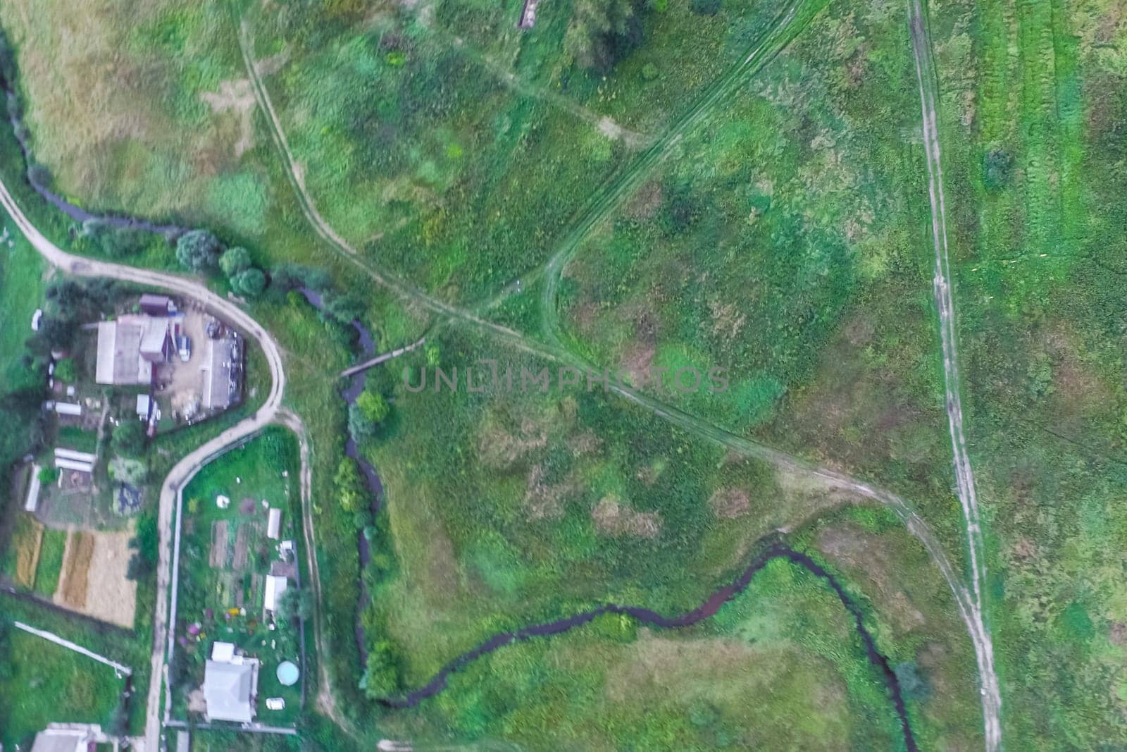 Top view of the village, fields and forests near the village