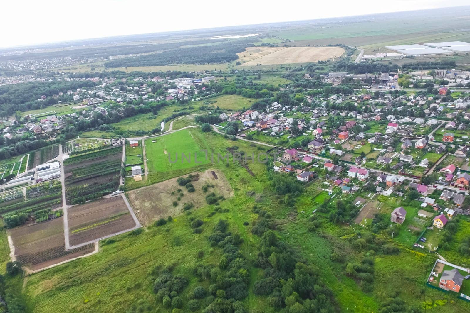 Top view of the village, fields and forests near the village