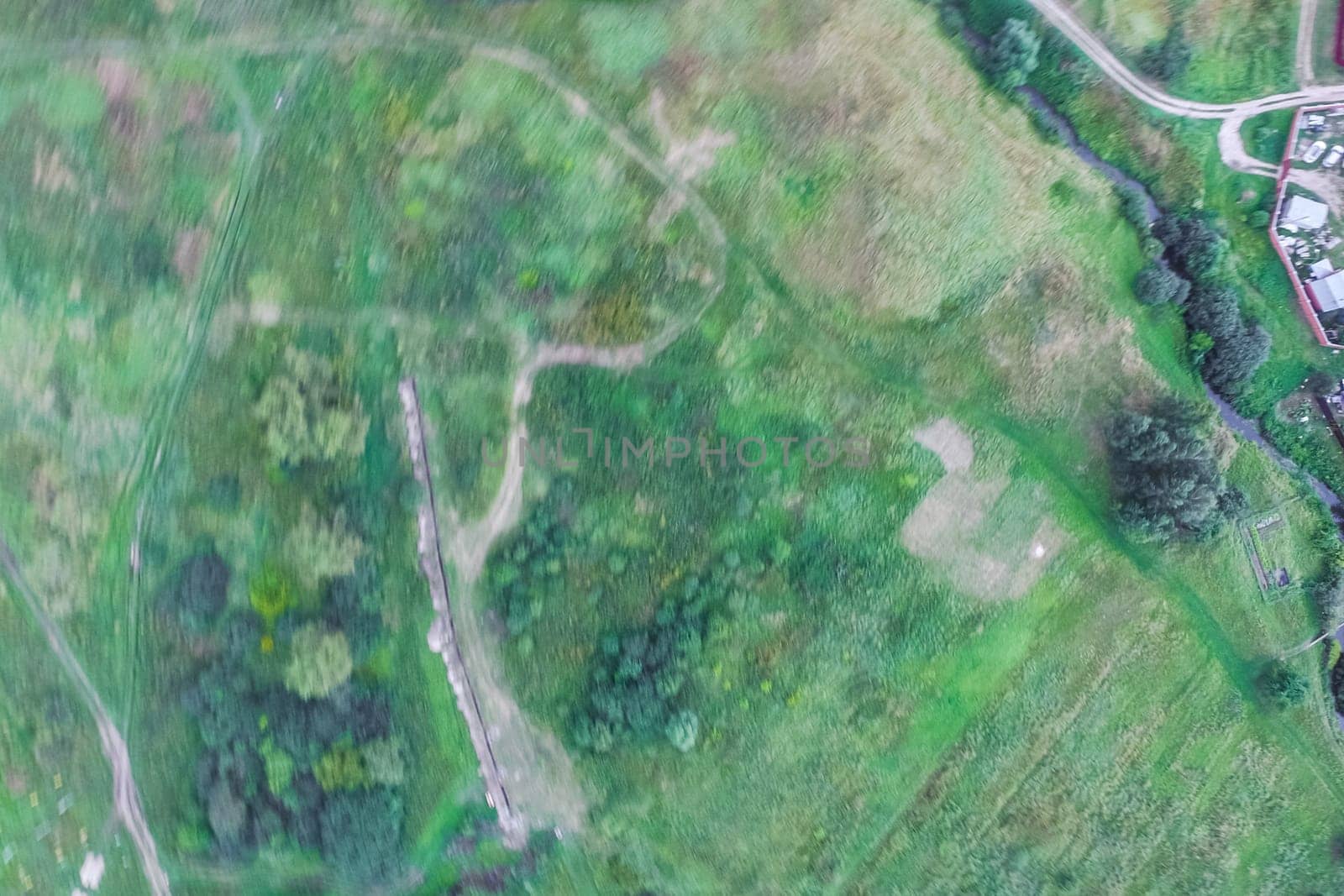 Top view of the village, fields and forests near the village