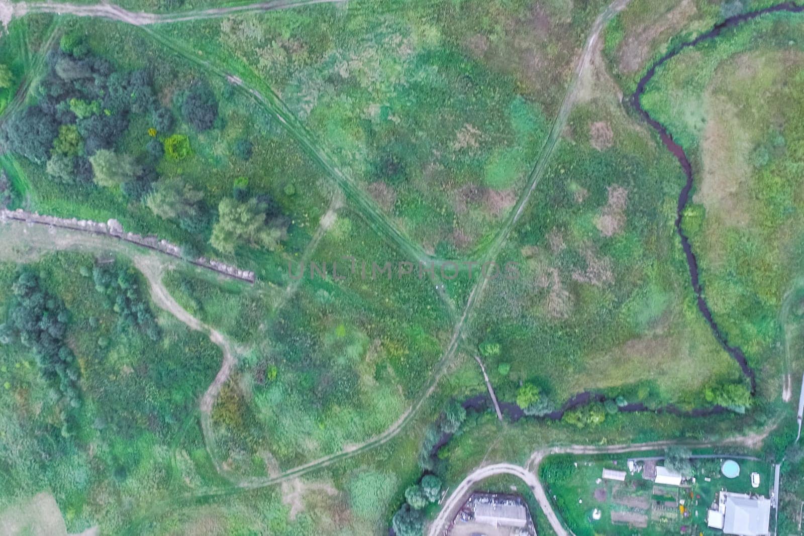 Top view of the village, fields and forests near the village