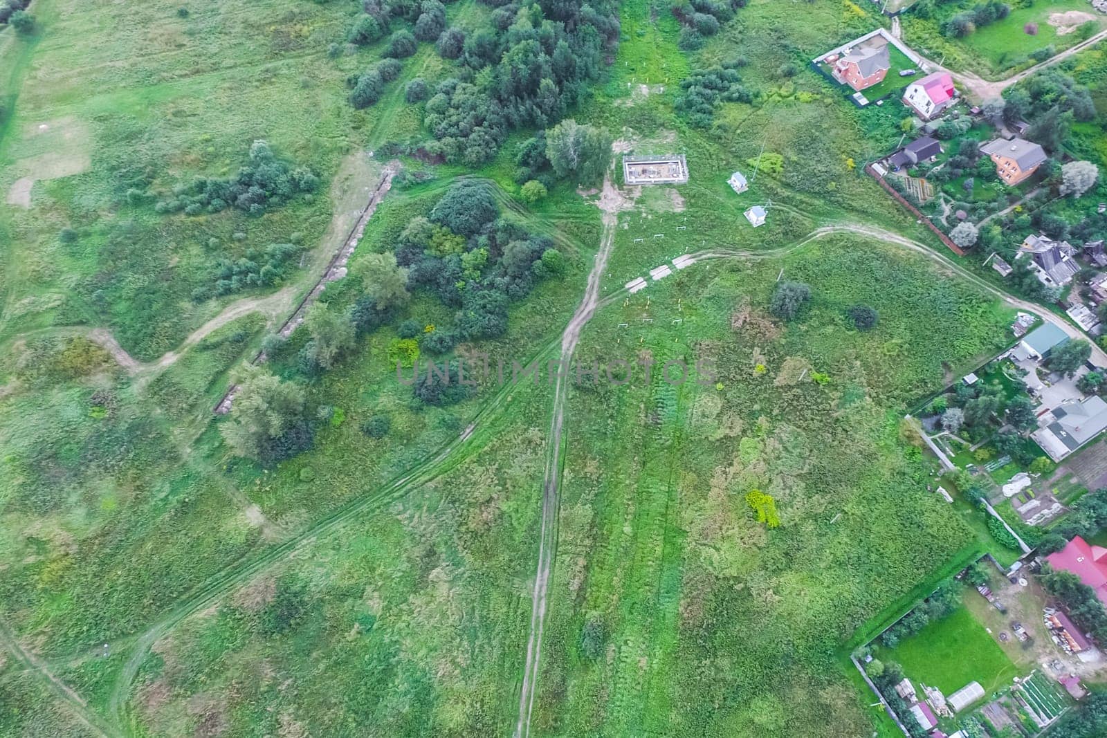 Top view of the village, fields and forests near the village
