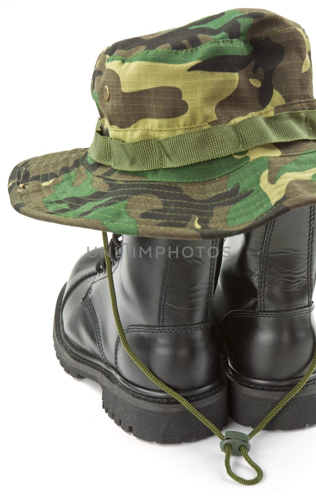 Camouflage hat and boots military equipment of the Armed Forces