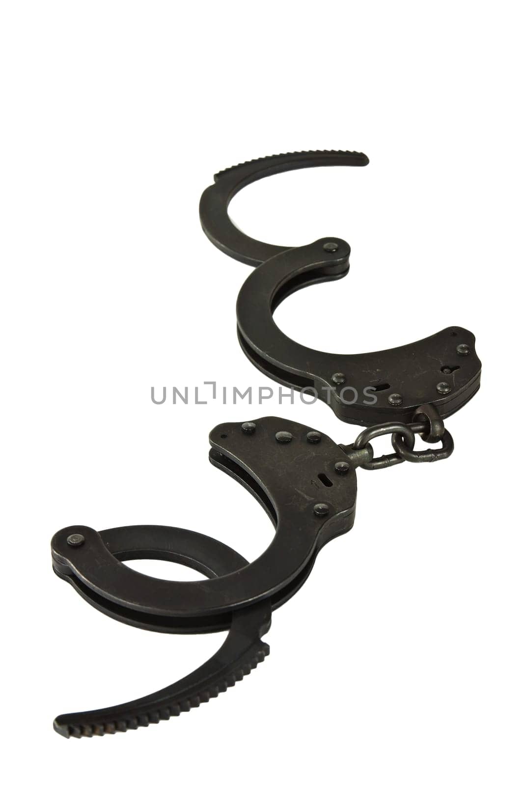 Black oxide police handcuffs on a white background