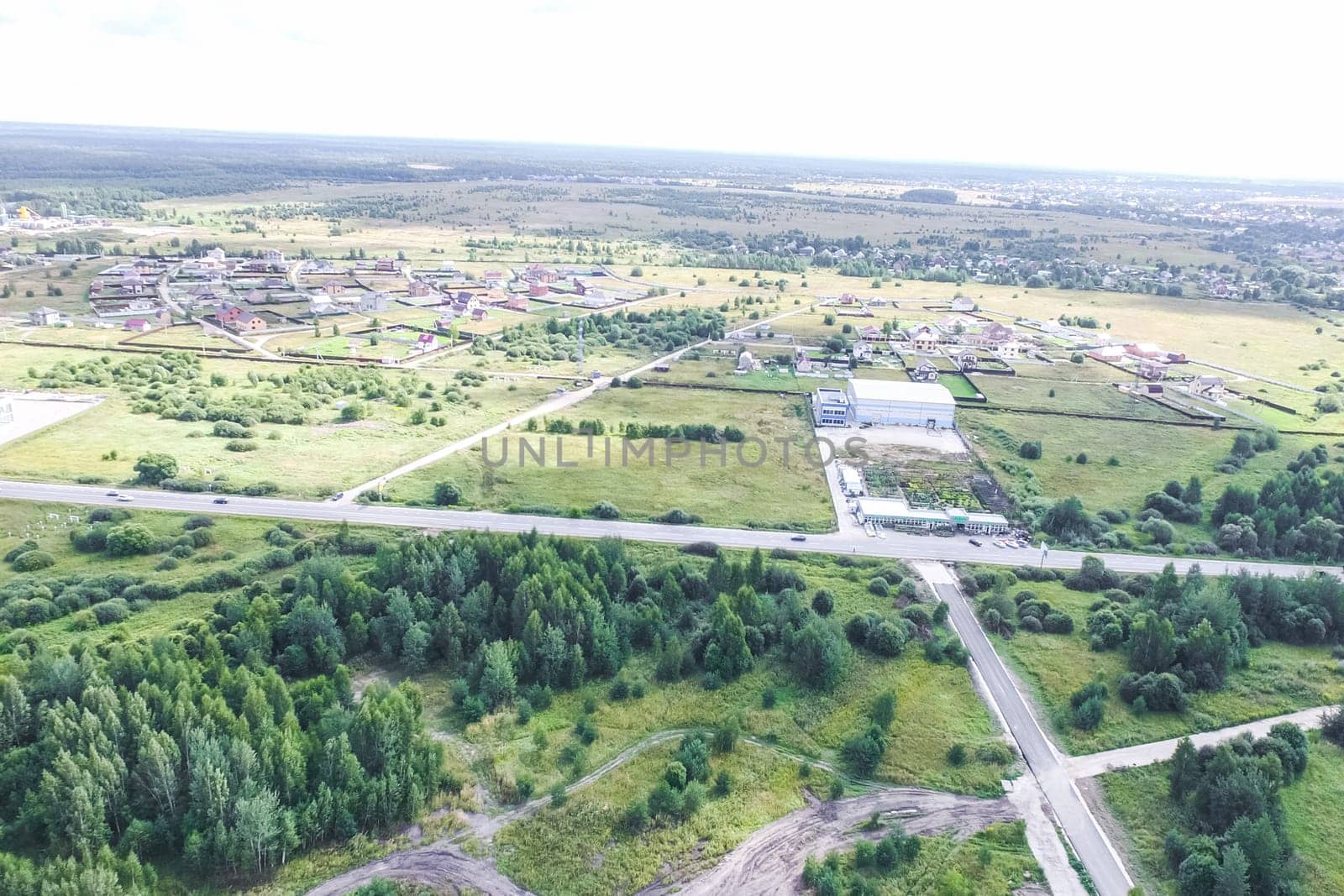 Top view of the village, fields and forests near the village