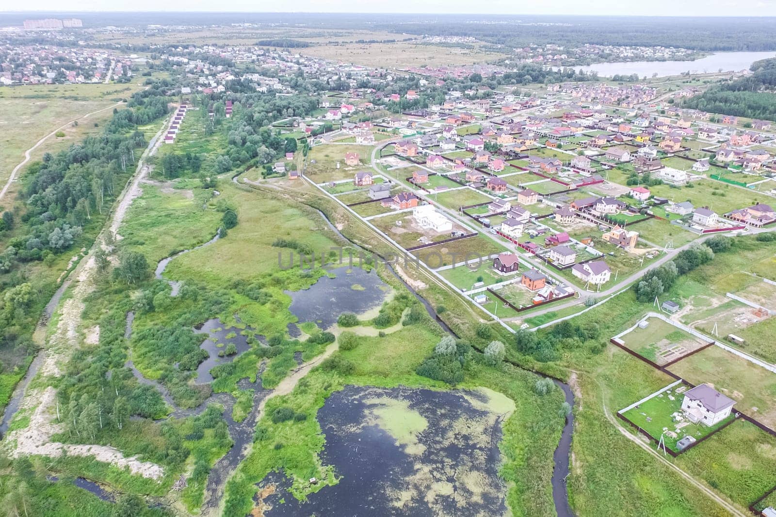 Top view of the village, fields and forests near the village