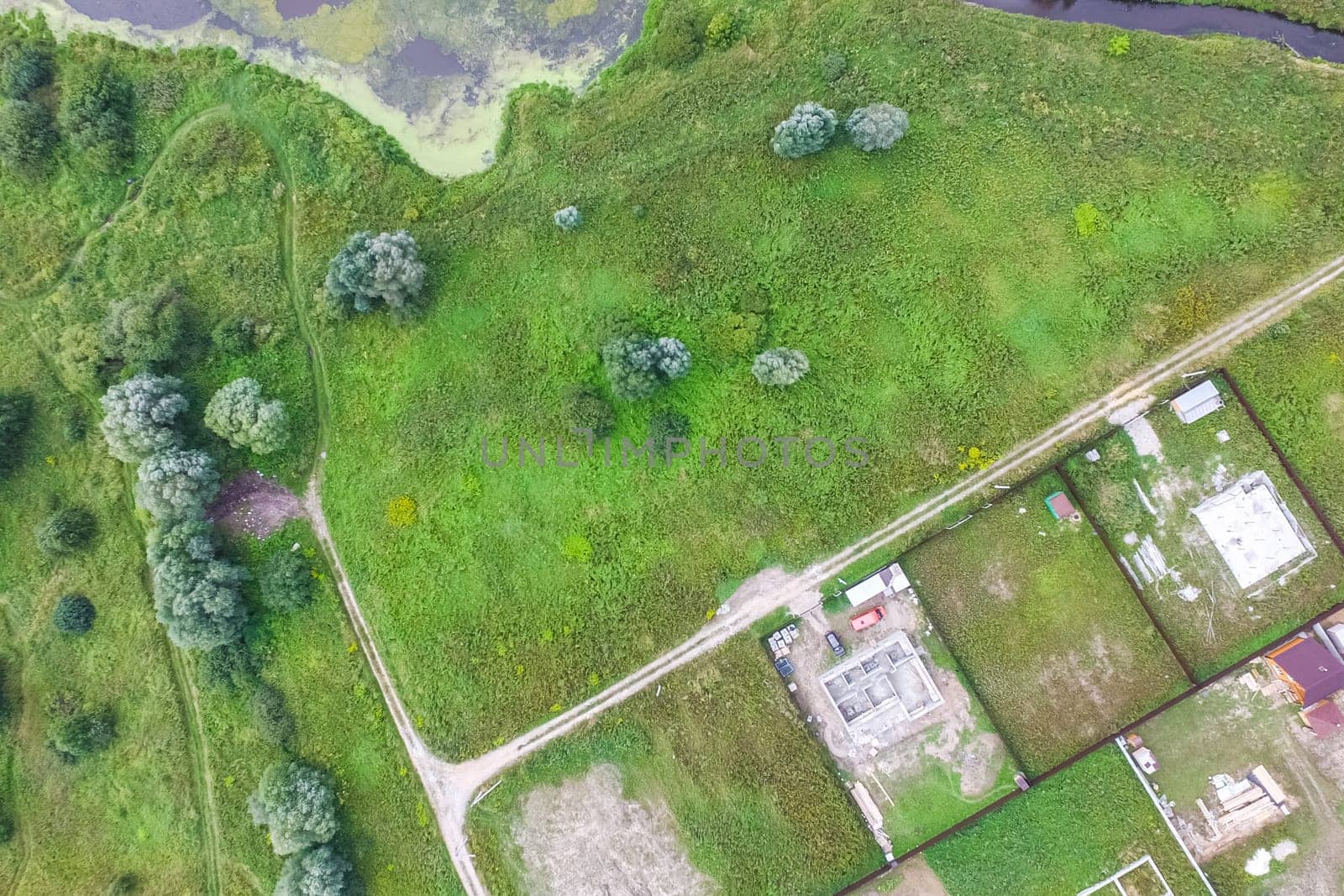 Top view of the village, fields and forests near the village