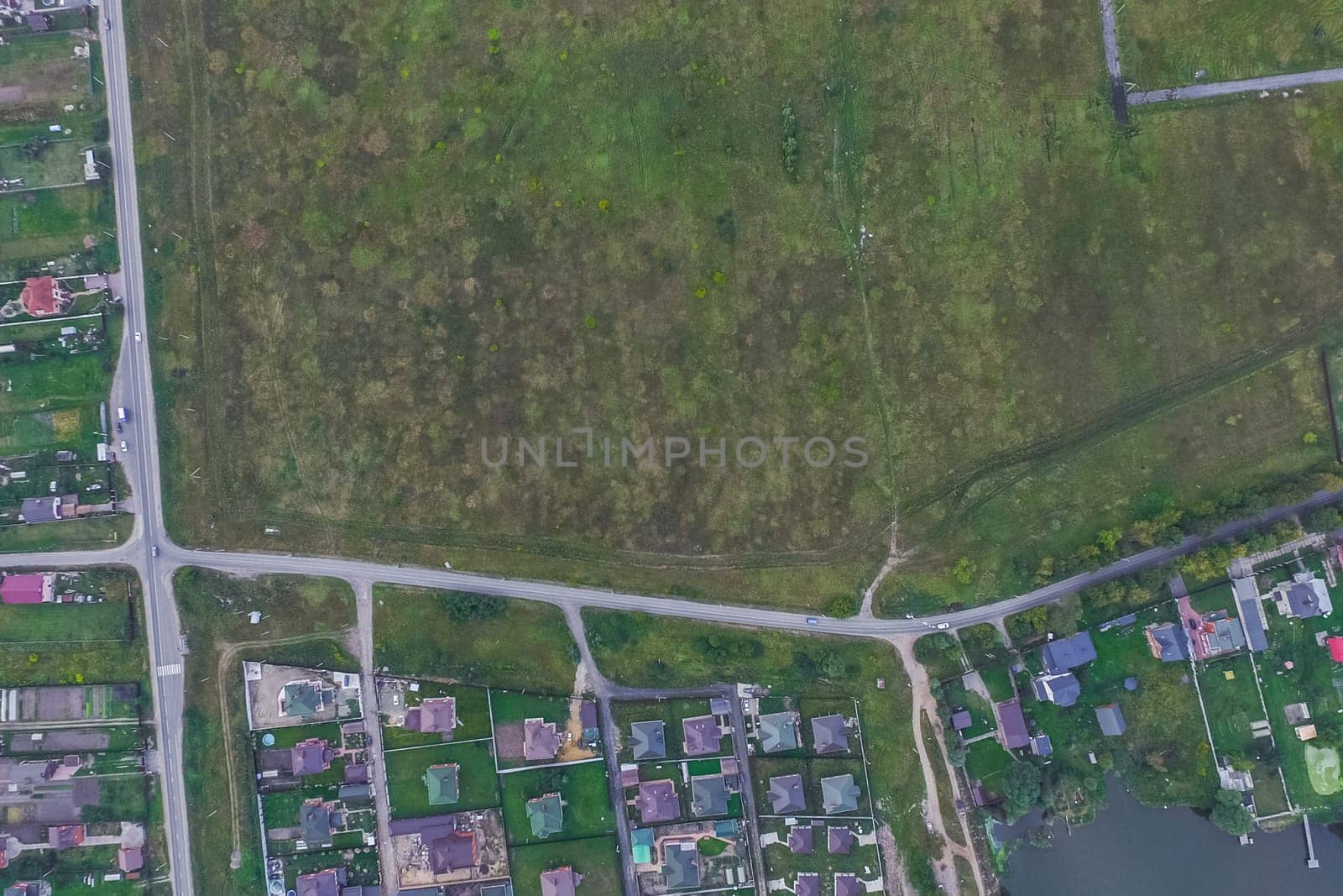 Top view of the village, fields and forests near the village
