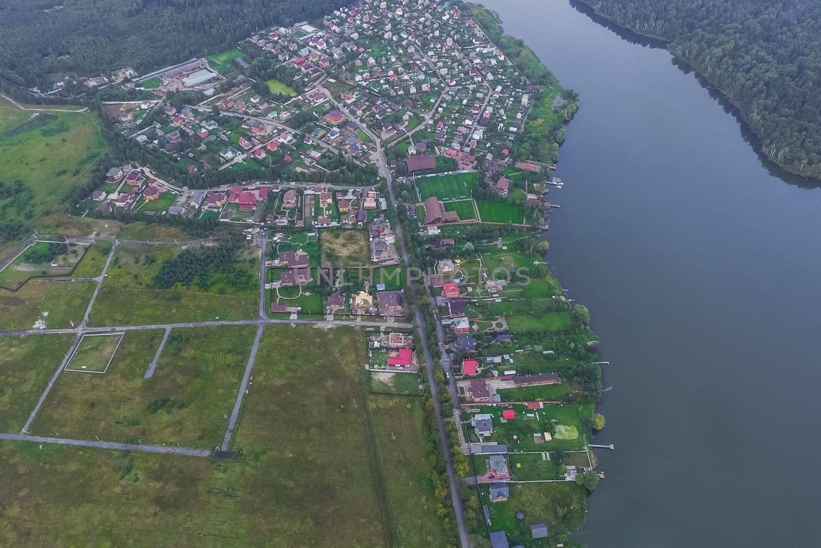 Top view of the village, fields and forests near the village