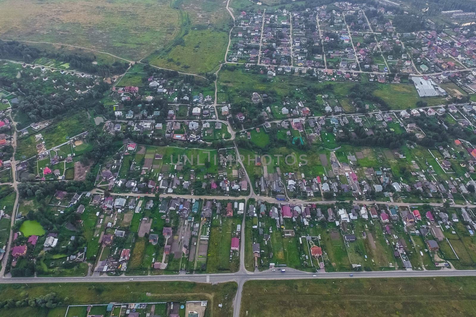 Top view of the village, fields and forests near the village