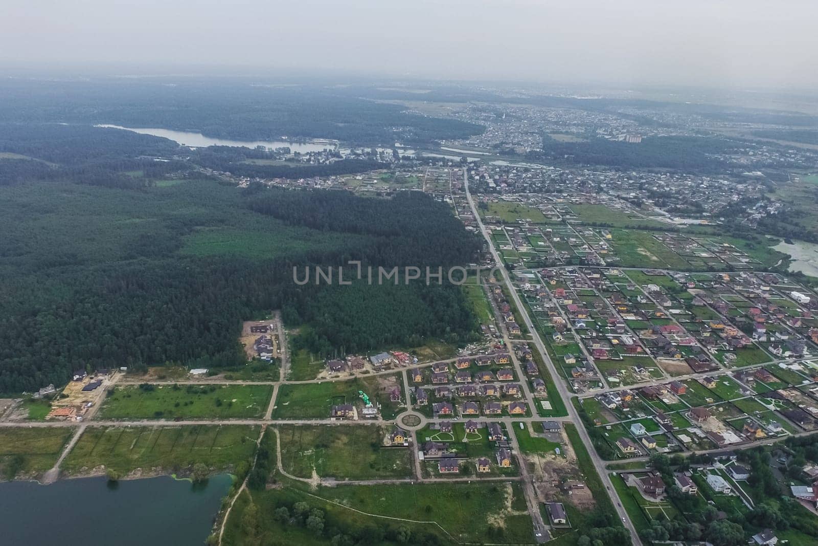 Top view of the village, fields and forests near the village