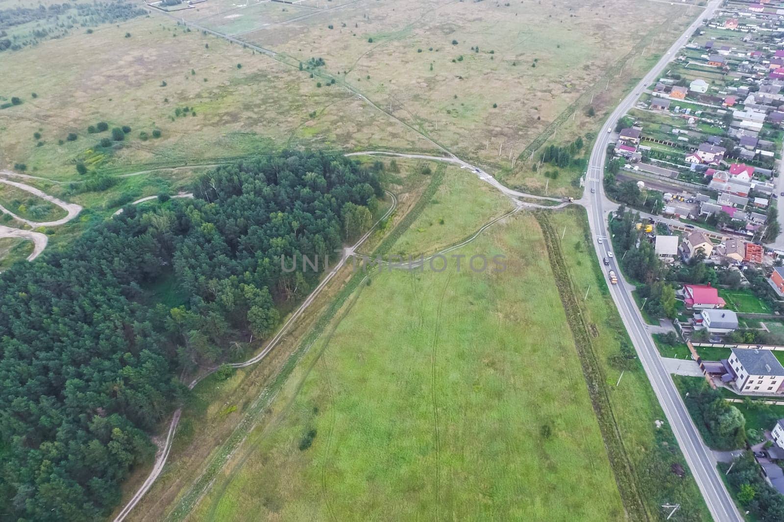 Top view of the village, fields and forests near the village