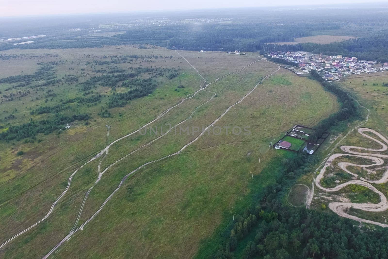 Top view of the village, fields and forests near the village