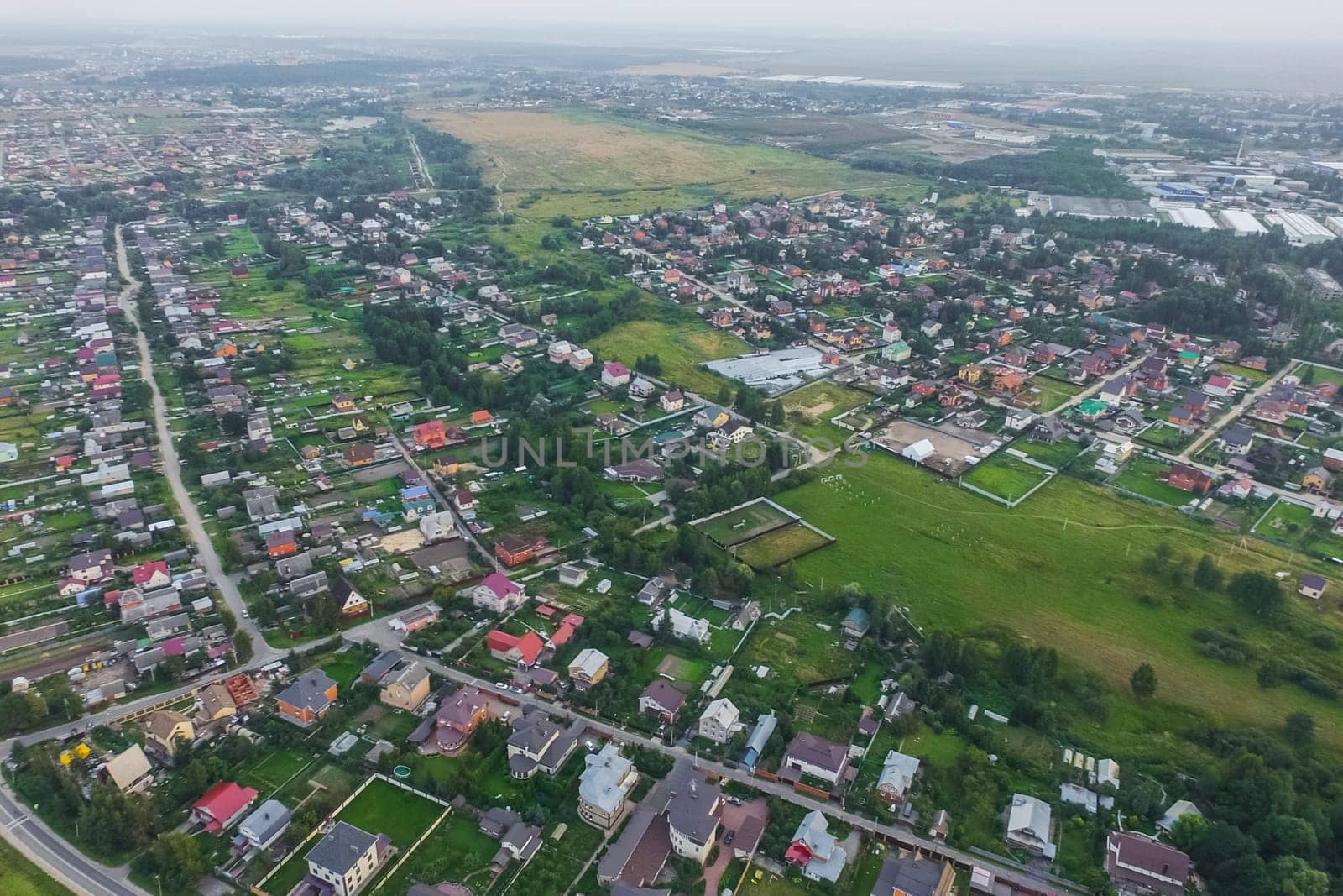 Top view of the village, fields and forests near the village